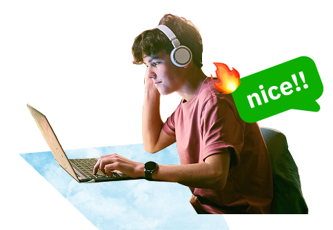 young man using a laptop with headphones